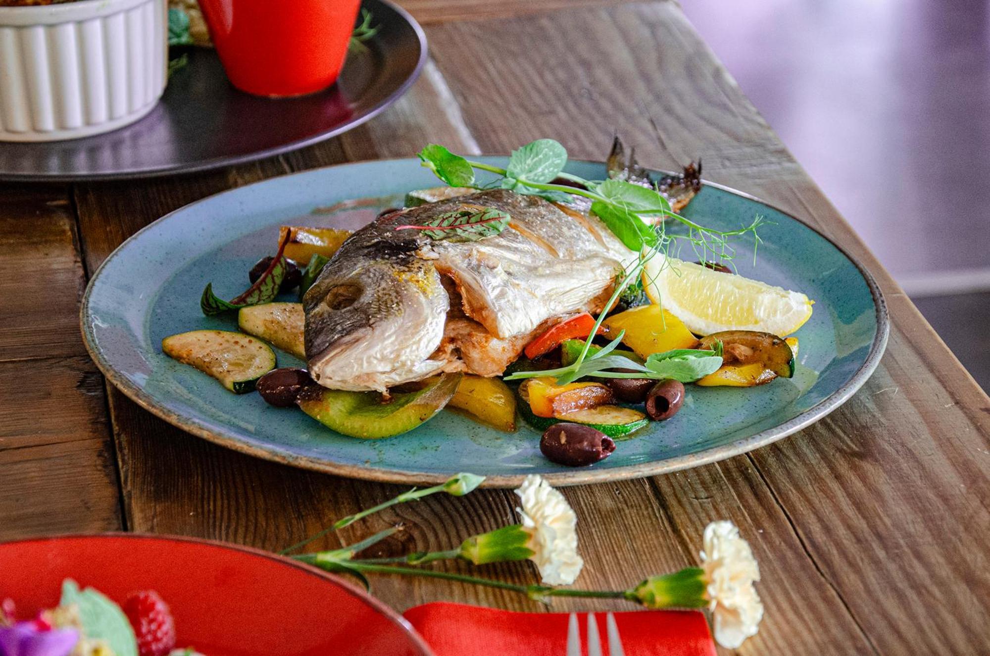 Willa Port Ostroda Exterior photo A plate of grilled fish